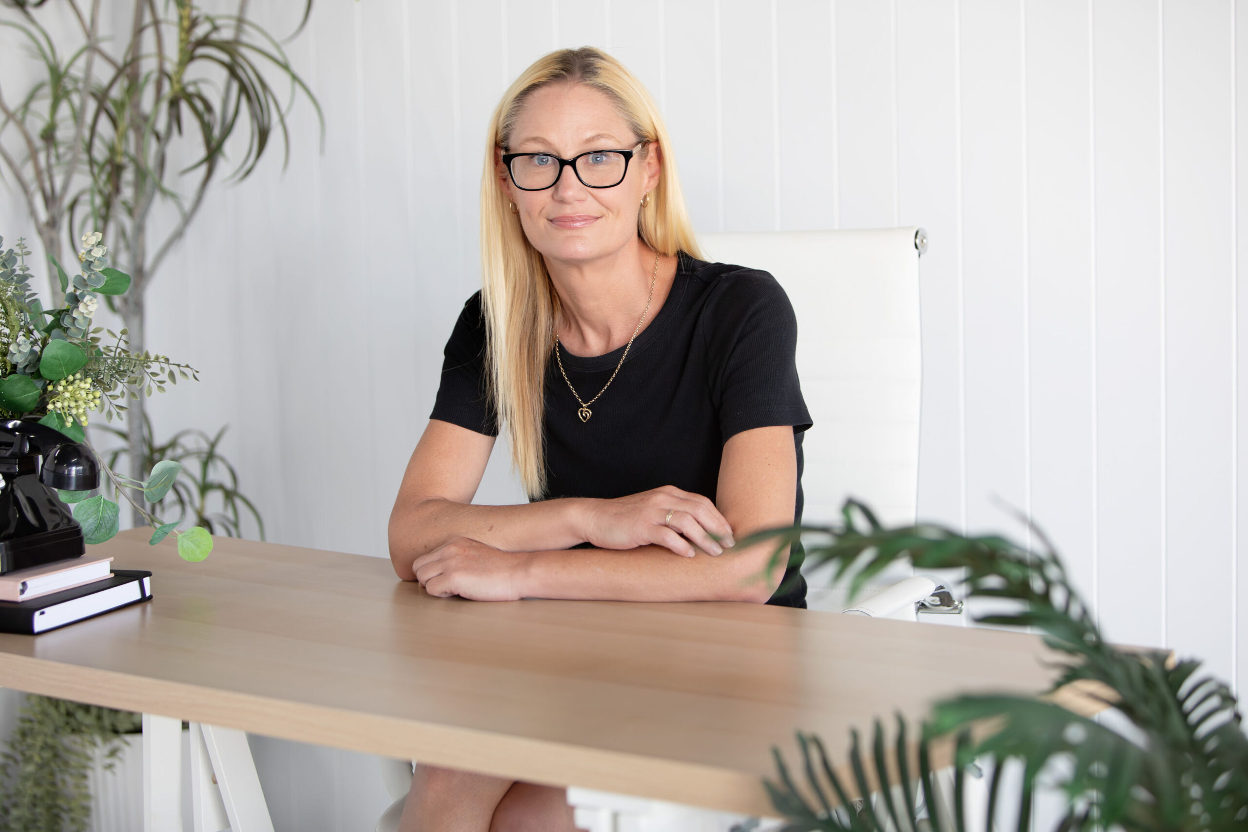 Melissa Tuck Senior Property Manager Sitting